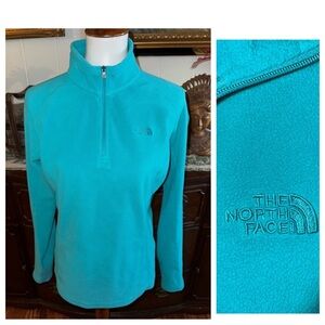 THE NORTH FACE size medium women’s turquoise quarter zip, pullover fleece jacket